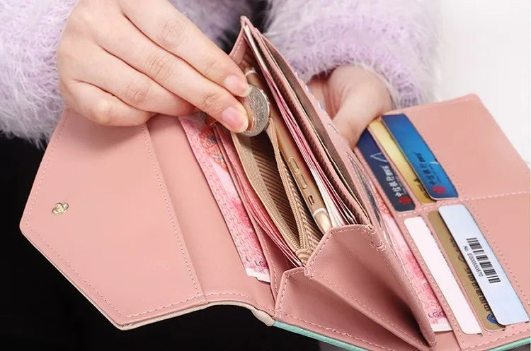 Vielseitige Damen Geldbörse. Kompakter Organizer für Karten, Bargeld und Smartphone. Elegant & funktional.