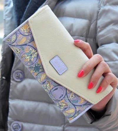 Stilvolle Damen Geldbörse in Clutch-Form. Ideale Mode Accessoires mit Telefon- und Kartenfach.