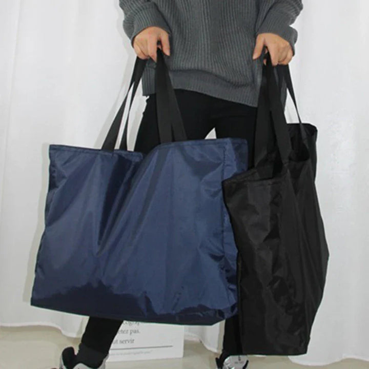 Damen Reisetasche faltbar, leicht & wasserfest. Ideal für Kurztrip, Sport & Handgepäck aus Polyester.