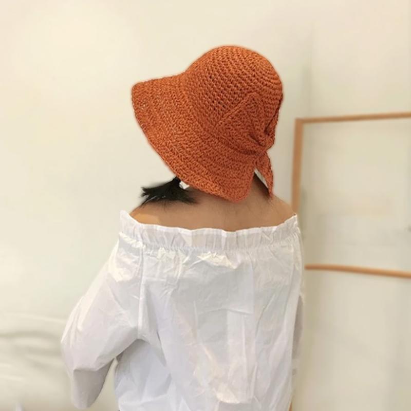 Eleganter Damen Retro Strandhut mit großer Schleife, faltbar & schützend für sonnige Sommertage.