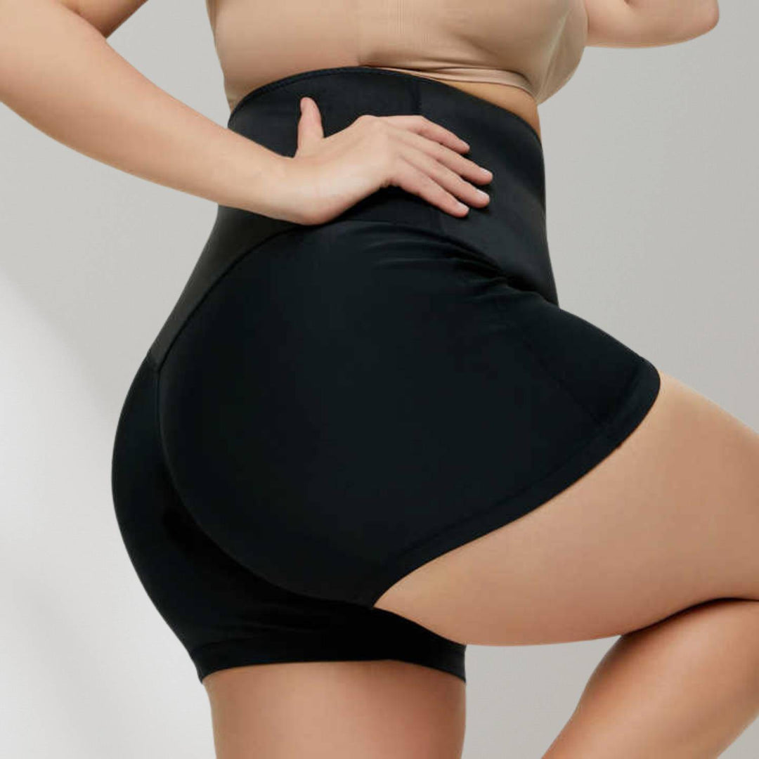 Rückansicht der Damen Schweißhose mit integriertem Taillentrainer, komfortabel für jedes Training.