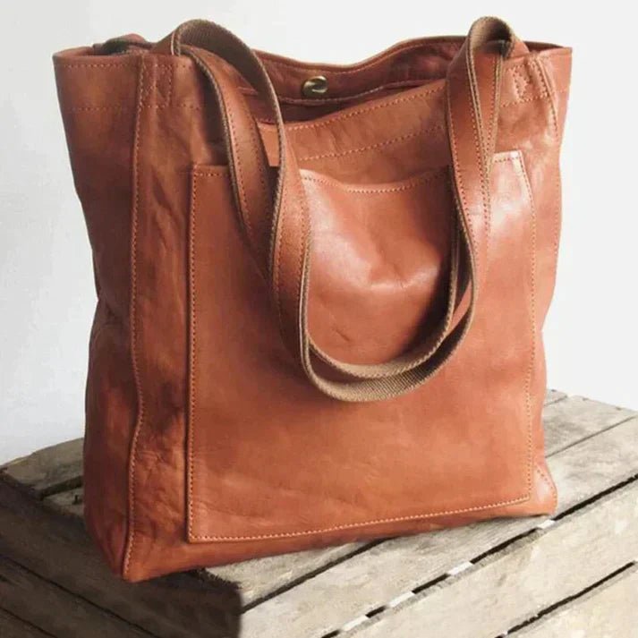 Damen Umhängetasche aus robustem Kunstleder, elegant und vielseitig für Alltag und Reise.