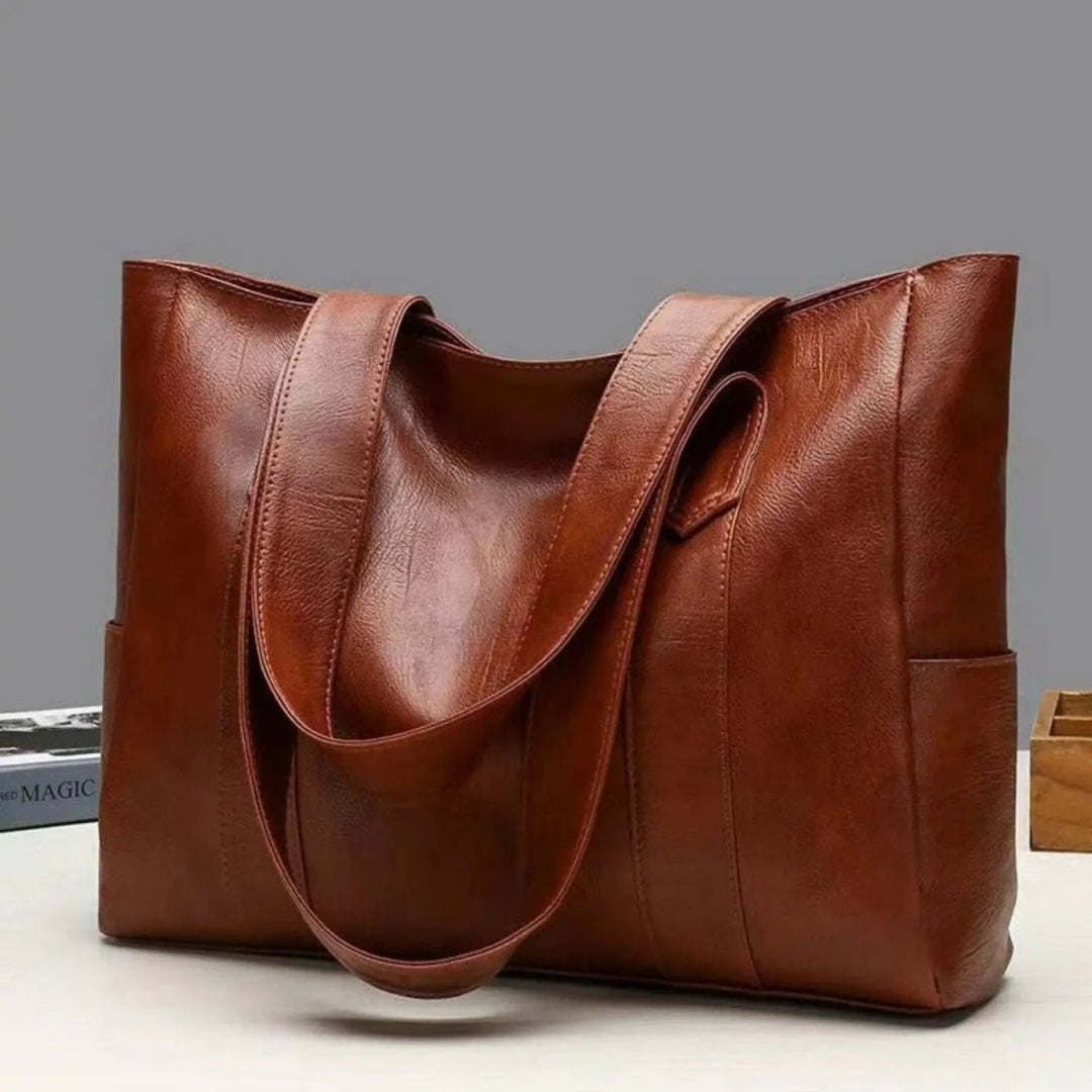 Elegante Vintage Schultertasche aus PU Leder, geräumig für alle wichtigen Dinge.