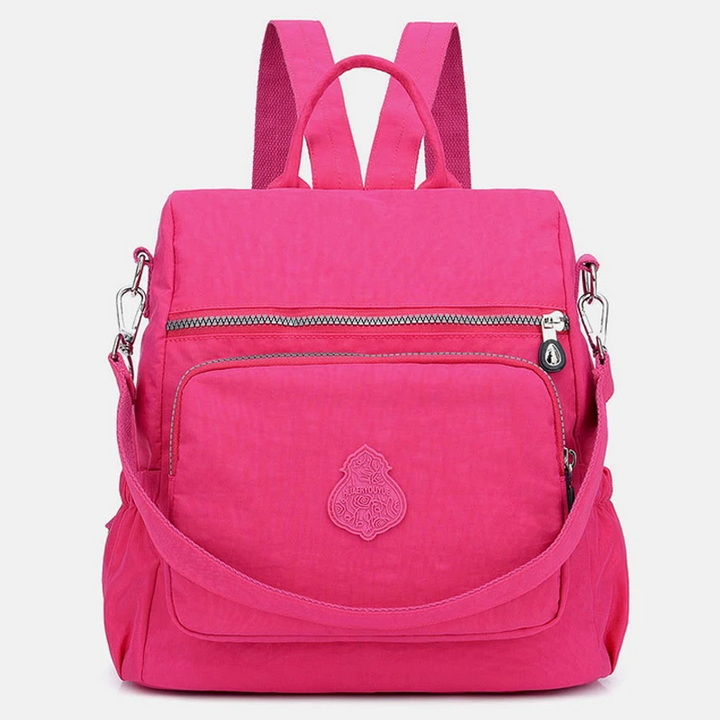 Wasserdichter Damenrucksack aus strapazierfähigem Nylon, leicht & elegant für Business & Freizeit.