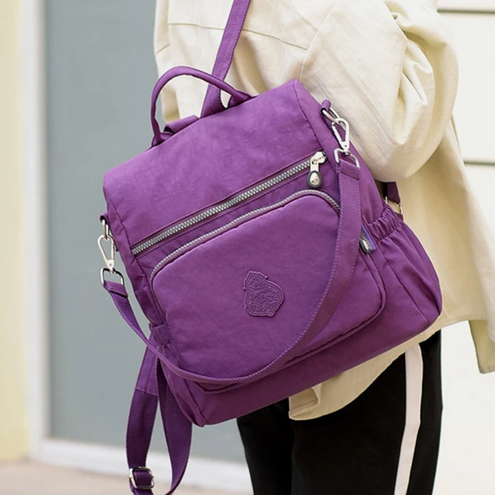 Wasserdichter Damenrucksack aus Nylon, elegant & leicht, ideal als Reise- oder Alltagsbegleiter.