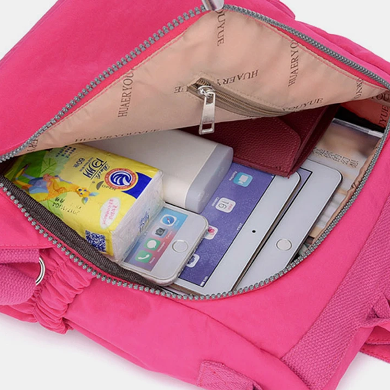 Nylon Damenrucksack wasserdicht, leicht, elegant, mit Diebstahlschutzfunktion für sichere Reisen.