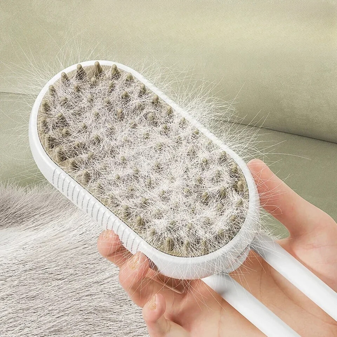 Ergonomische Dampfbürste zur Fellpflege bei Haustieren. Entfernt lose Haare und massiert sanft.