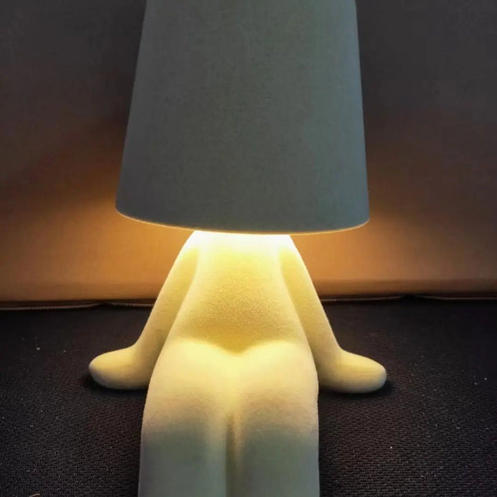 Elegante HUMISHAPE LED-Kunstleuchte in Menschenform. Dekorative und wiederaufladbare moderne Beleuchtung.