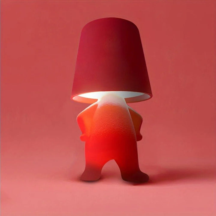 Wiederaufladbare HUMISHAPE LED-Tischlampe. Eine moderne Designlampe in Menschenform für stilvolles Licht.
