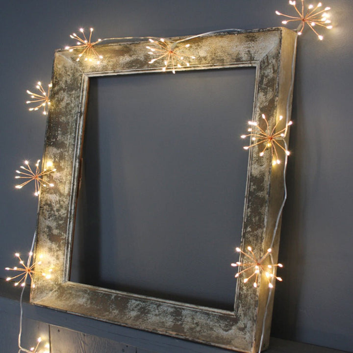 Stimmungsvolle Kupfer-Lichterkette mit warmweißen LEDs, flexibel formbar für individuelle Innen- & Außendekoration.