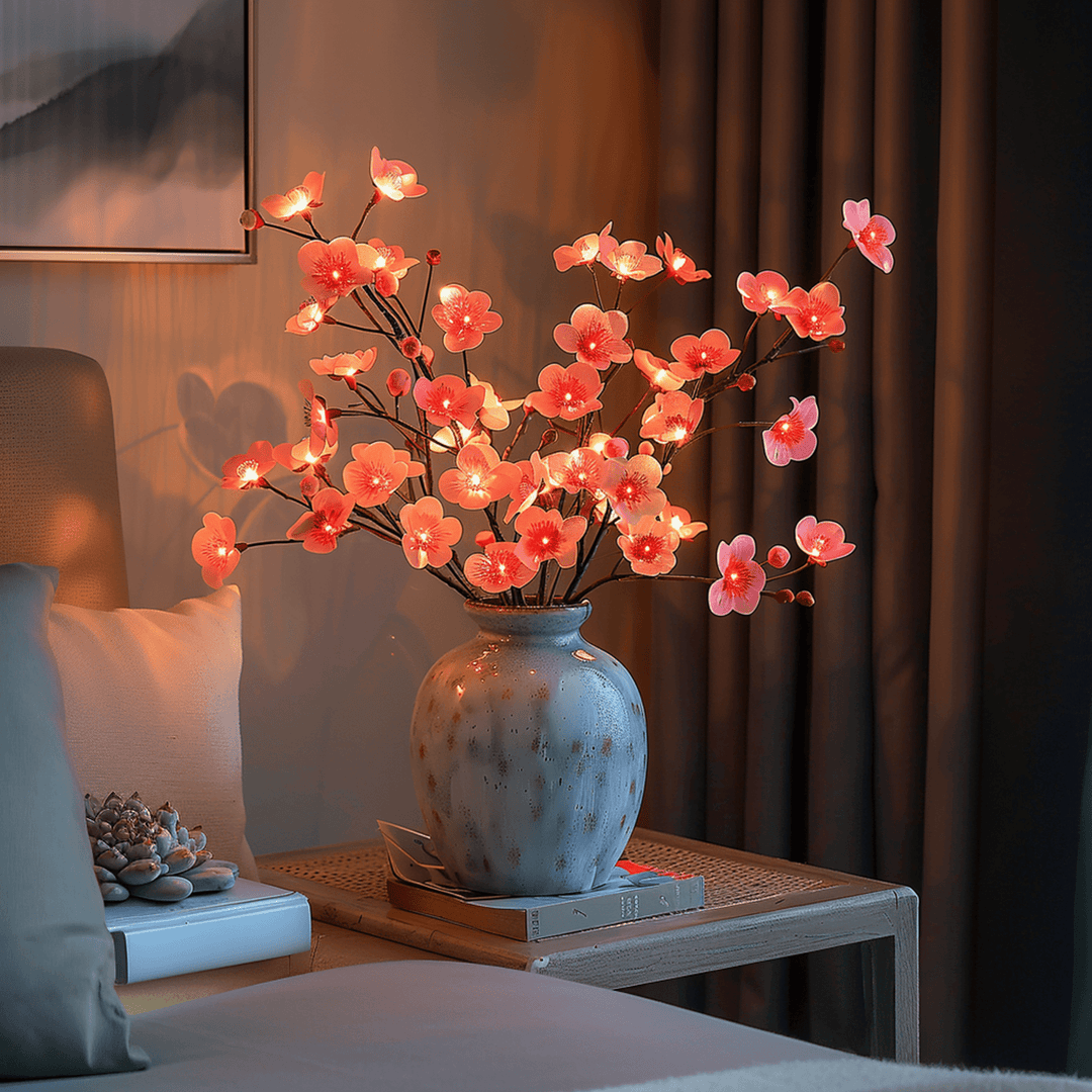 Magischer LED-Zweig mit warmweißen LEDs, ideal für festliche Dekoration oder als Nachtlicht.