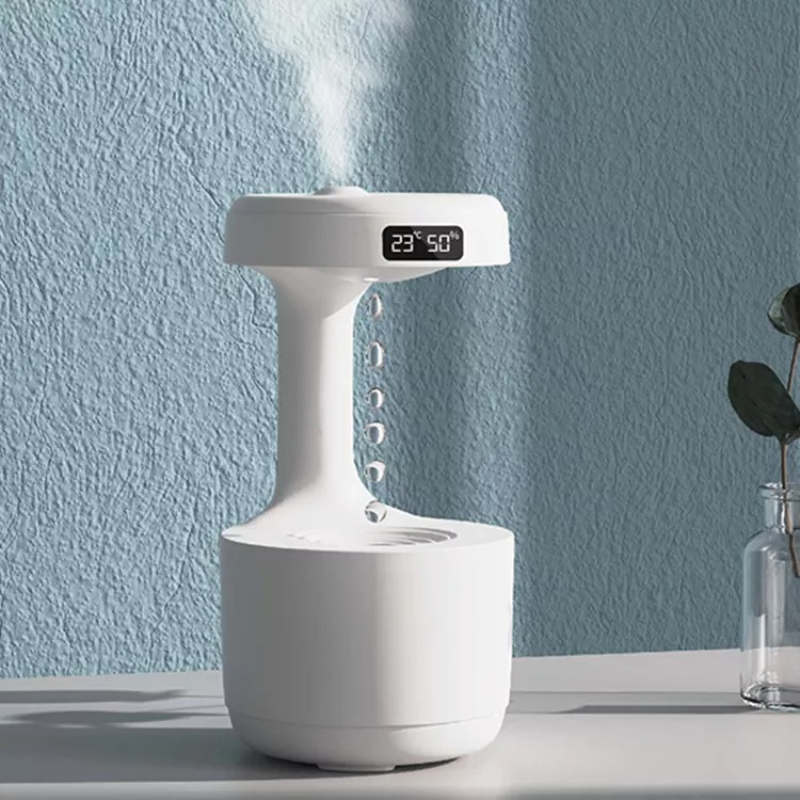 Dekorativer Luftbefeuchter mit beruhigendem Wasserfluss; ideal für Entspannung & besseres Raumklima im Wohnzimmer.
