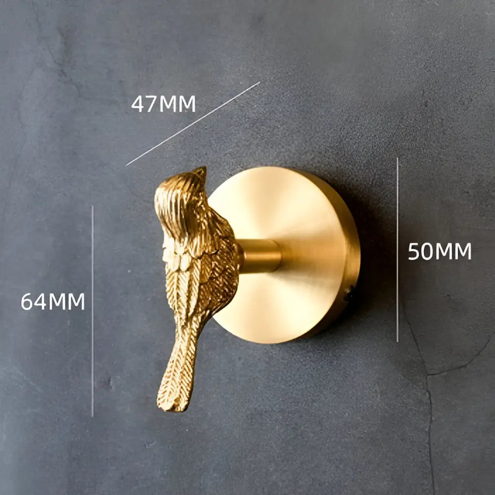 Moderner Gold-Wandhaken, stilvolles Vögel-Motiv, perfekt für Schlüssel, Handtücher oder Accessoires.