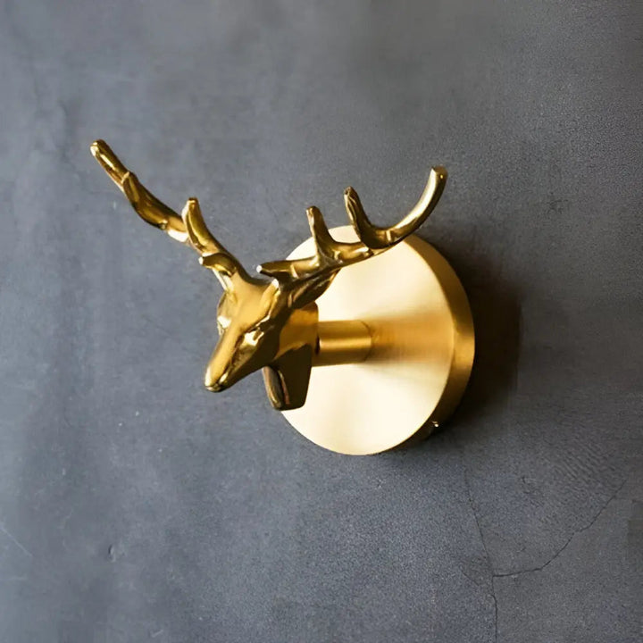 Glänzender Gold-Finish Wandhaken mit elegantem Tiermotiv, langlebig, robust & sehr dekorativ.