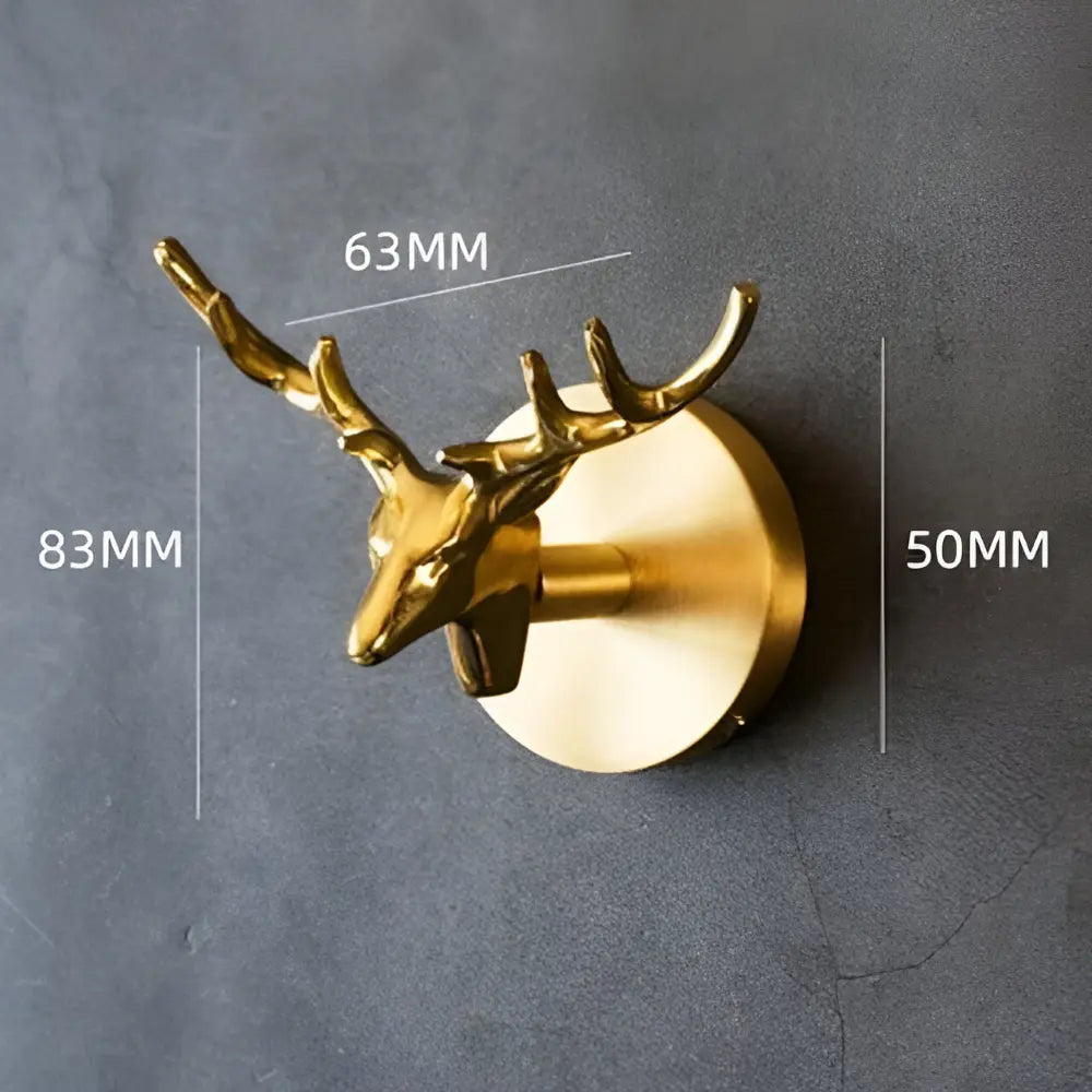 Funktionaler & dekorativer Gold-Garderobenhaken mit Elefantenkopf-Design für stilvolle Organisation.