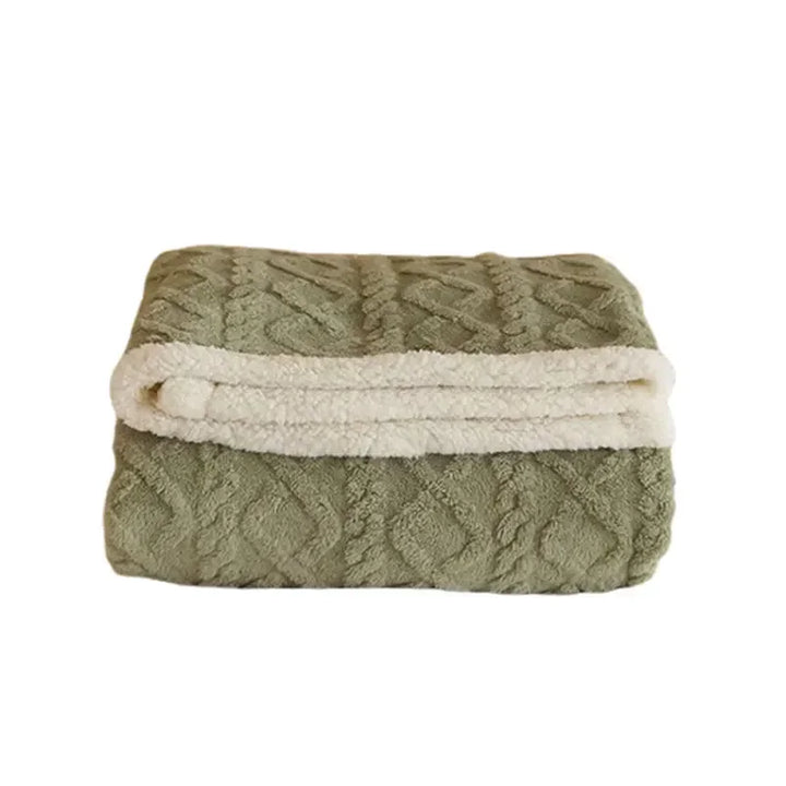 Winterdecke aus Lammwolle mit Fleece, gemütlich und warm, perfekt als stilvolle Heimtextilie.