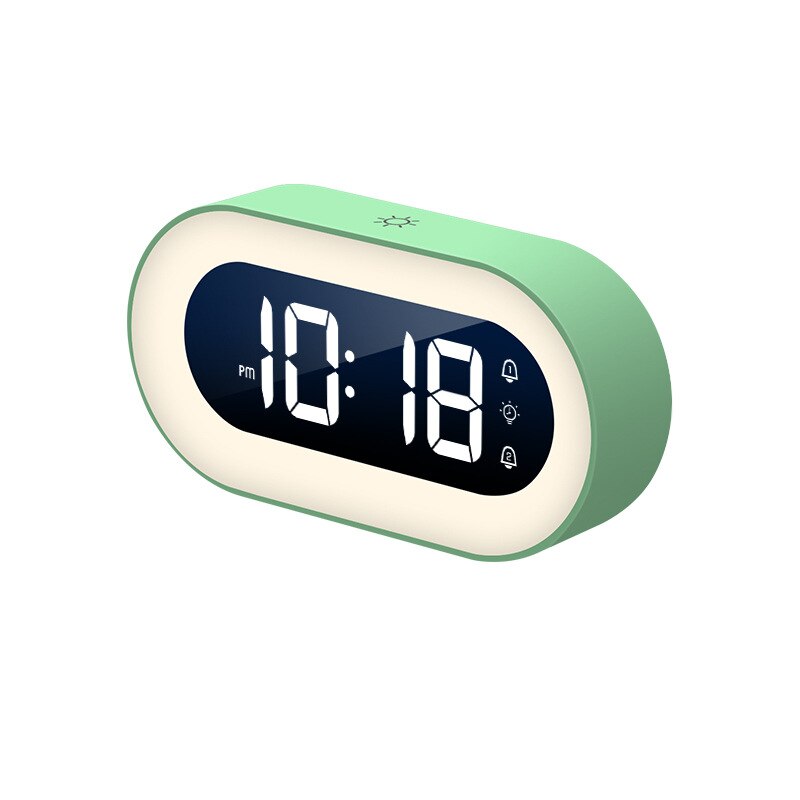 Kompakter Digitalwecker Lumino mit beruhigendem Nachtlicht. Zeigt die Uhrzeit digital an, ideal für Schlafzimmer.