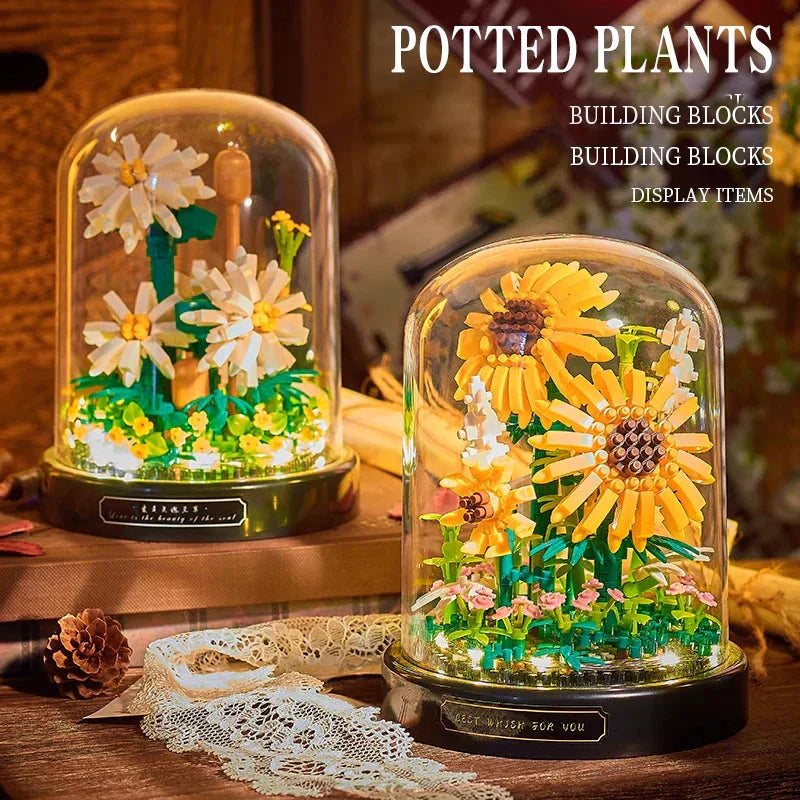 Kind und Eltern bauen gemeinsam ein Blumenmodell aus Mikrobausteinen, Familienspaß.