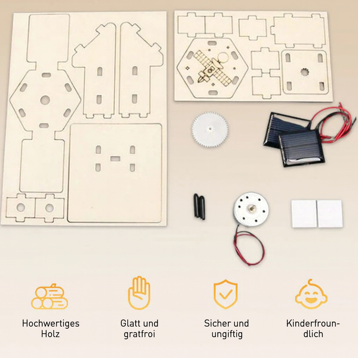 Kind baut einen DIY Satelliten Bausatz aus Holz; spannendes Lernspielzeug & Geschenk für junge Weltraumfans.