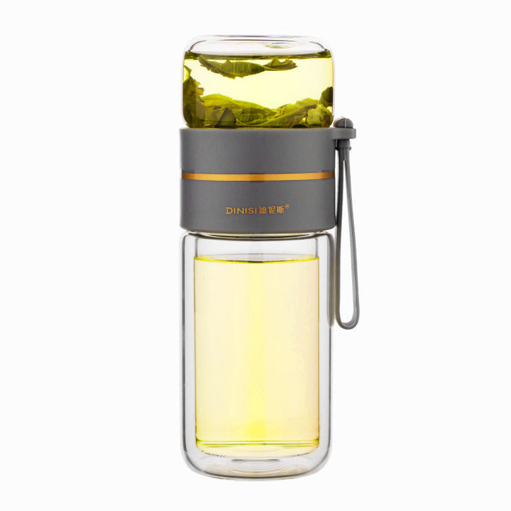 Doppelwandige Glasflasche als Isolierflasche für heißen oder kalten Tee mit Sieb und Trageschlaufe.