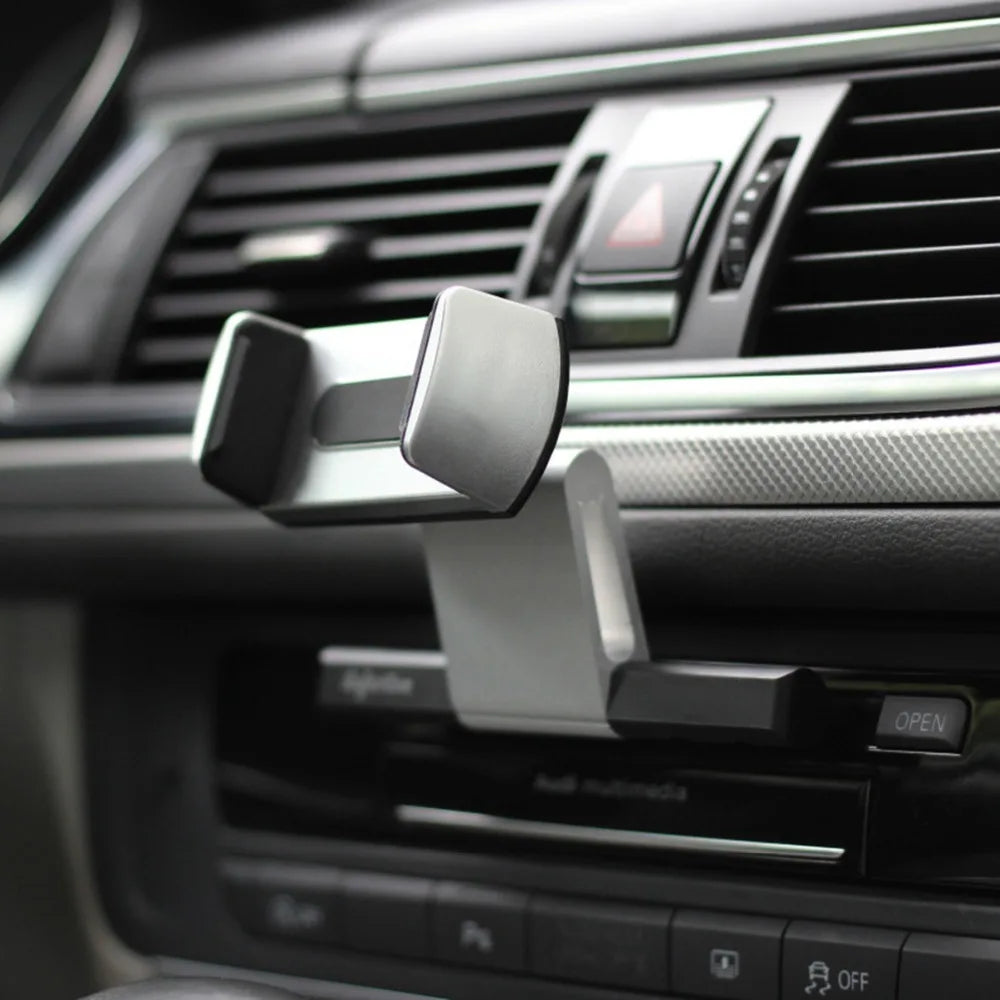 Flexible DriveFlexx Handyhalterung mit 360° drehbarer Klemme für optimale Sicht auf das Smartphone im Auto.