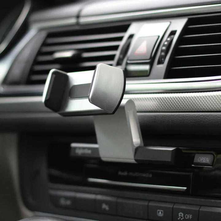 Flexible DriveFlexx Handyhalterung mit 360° drehbarer Klemme für optimale Sicht auf das Smartphone im Auto.