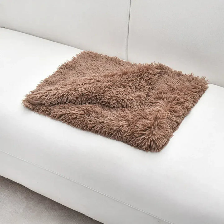 Dunkelgraues Plüsch-Tierbett für Hunde, ideal für Tiefschlaf. Waschbar, rutschfest & warm.