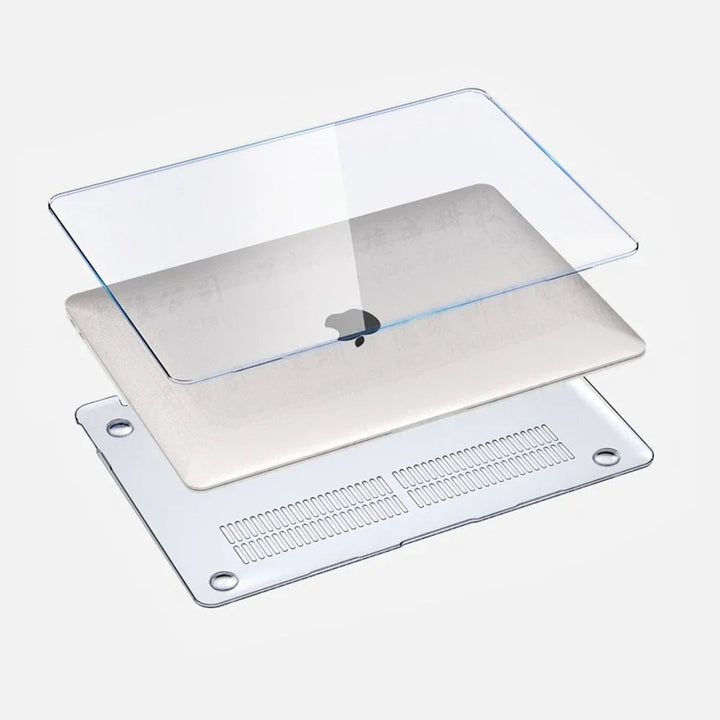 MacBook mit transparenter Hülle auf einem Schreibtisch. Essentielles Laptop Zubehör für optimalen Schutz.