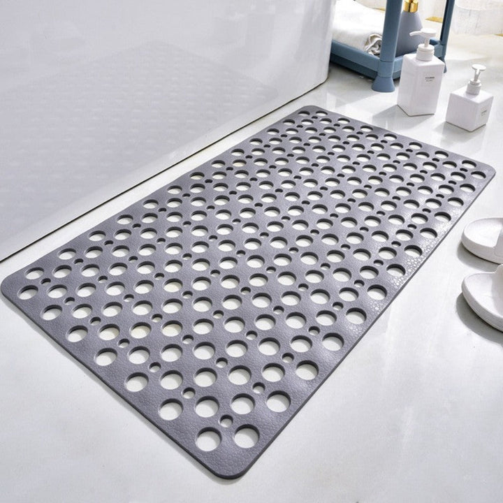 Graue antibakterielle Duschmatte SafeStep mit effektivem Rutschschutz für sichere & hygienische Duschmomente.