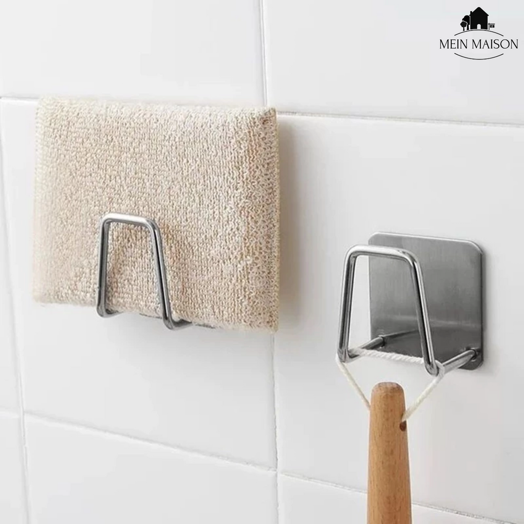 Eleganter Schwammhalter aus Edelstahl für die Küche, sorgt für ordentliche und trockene Schwämme am Spülbecken.