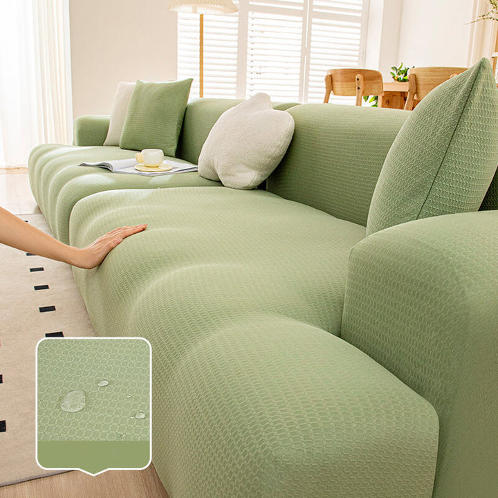 Familienfreundlicher Sofabezug, wasserdicht & strapazierfähig, ideal für ein unbeschwertes Wohnzimmer.