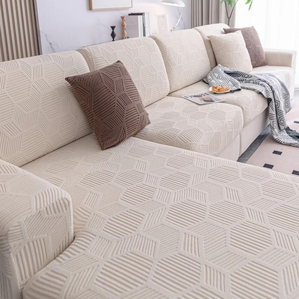 Dehnbarer Sofabezug mit Jacquard-Wabenmuster. Passt sich perfekt an verschiedene Sofagrößen an.