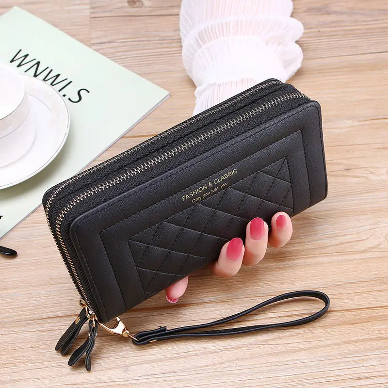 Elegante Damen Clutch in Schwarz-Weiß mit Doppelreißverschluss. Stilvolle Geldbörse für organisierte Frauen.