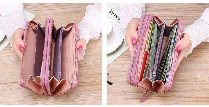 Organisierte Damen Clutch, schwarz-weiß, mit zwei Reißverschlussfächern. Praktisches Portemonnaie für Stilbewusste.