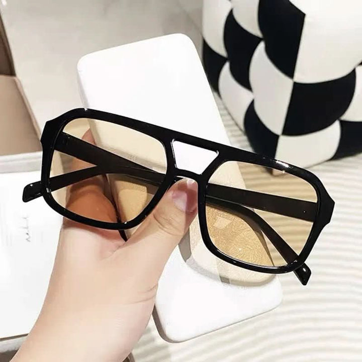 Dunkle, elegante Damen Katzenaugen-Sonnenbrille mit UV400-Schutz, idealer Augenschutz, stilvolles Design.