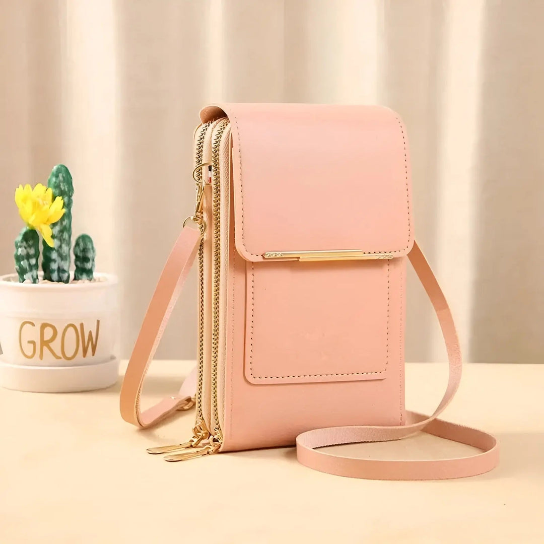 Detailansicht der eleganten Damen Schultertasche mit sicheren Reißverschlüssen und RFID-Schutz.