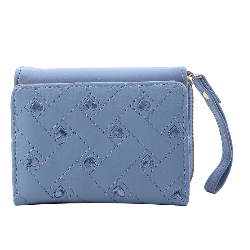 Stilvolle, kompakte Damen Brieftasche. Elegantes Dreifach-Portemonnaie für Frauen, ein vielseitiges Accessoire.
