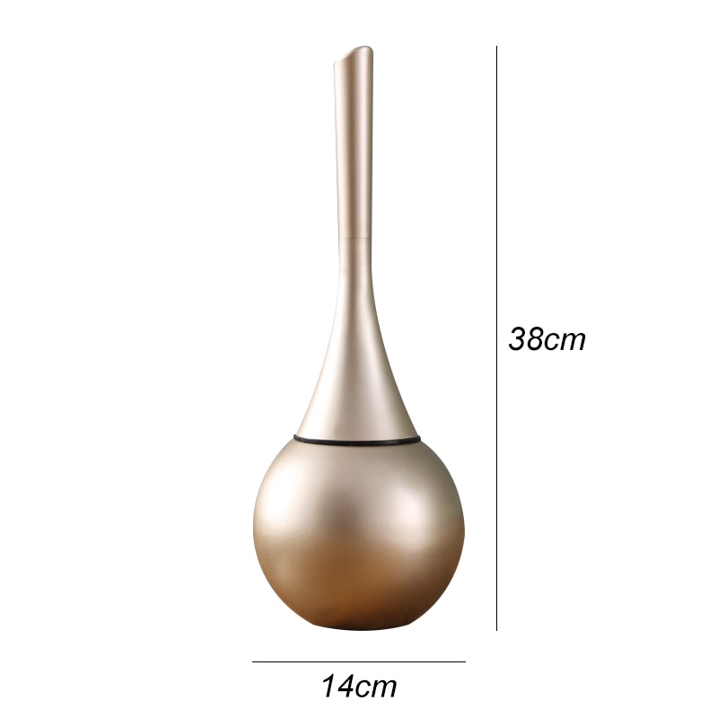 Moderne Toilettenbürste in Gold mit hygienischer Funktion, ein stilvolles Badaccessoire.