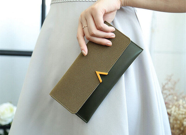 Alltagsbegleiter: Stilvolle lange unisex Geldbörse mit elegantem Goldverschluss, praktisch & modisch.