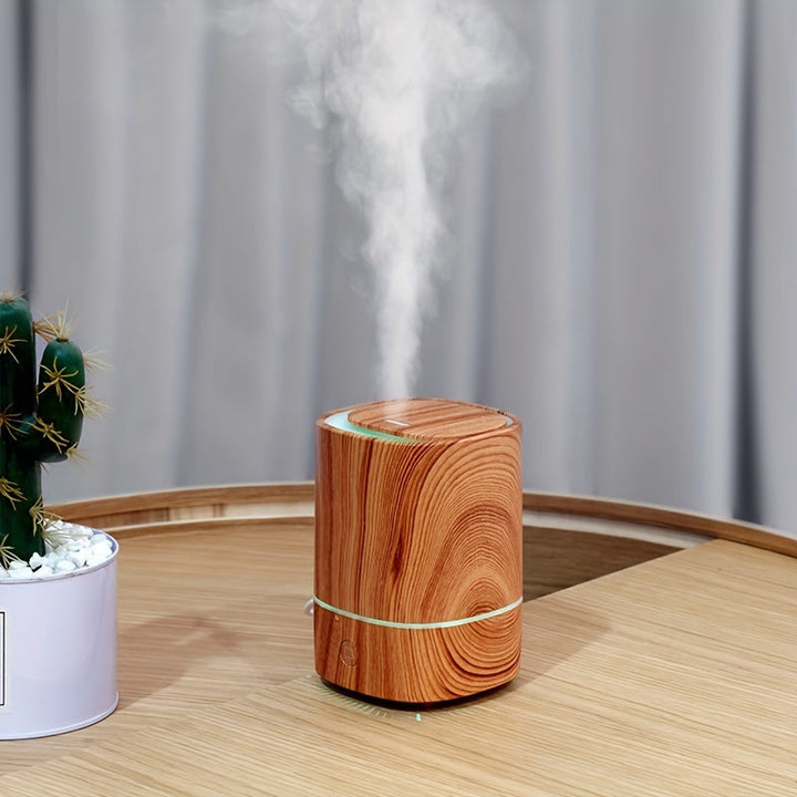 Eleganter Aromatherapie-Diffuser & Luftbefeuchter in Holzoptik mit LED-Beleuchtung. Für Entspannung & Wohlbefinden.