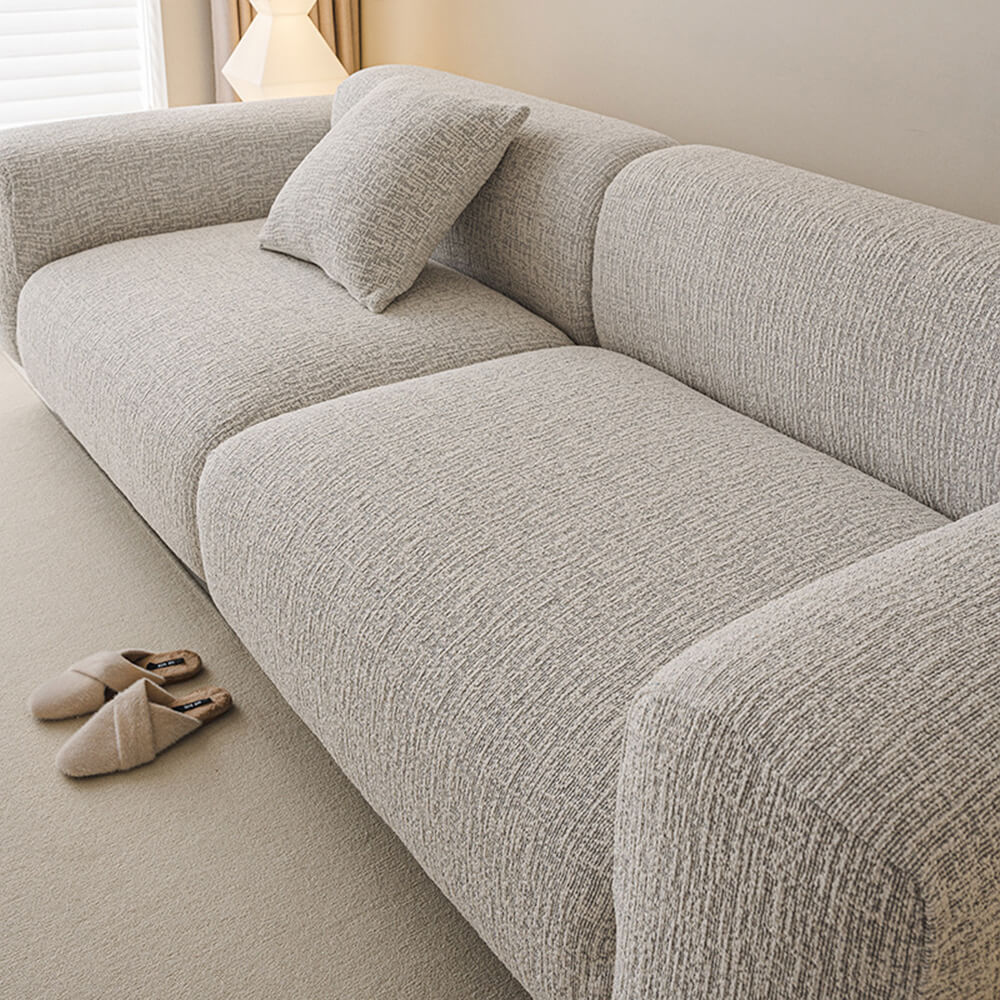 Kratzfester Chenille Sofaschutz für Haustiere. Elastischer Überzug, schützt Möbel effektiv vor Abnutzung.
