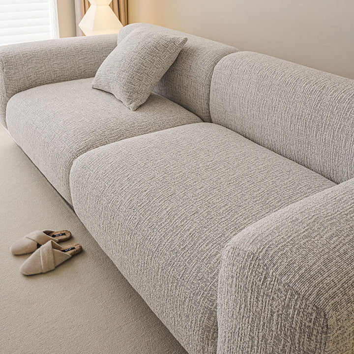 Kratzfester Chenille Sofaschutz für Haustiere. Elastischer Überzug, schützt Möbel effektiv vor Abnutzung.