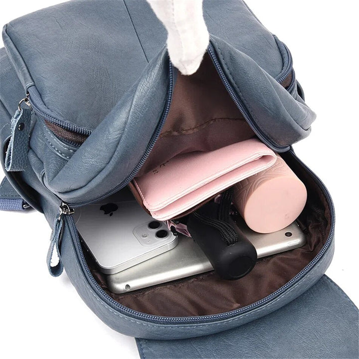 Blauer Damen-Lederrucksack, vielseitig als Rucksack oder Handtasche nutzbar.