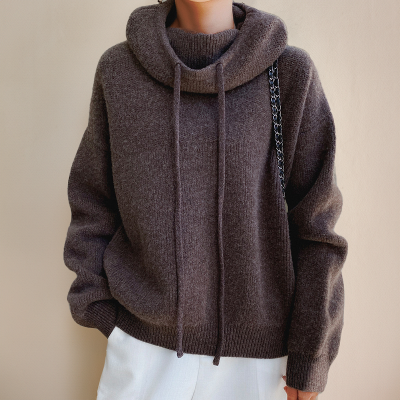 Trendiger Damenpullover in Feinstrick-Optik. Eleganter Langarm-Pullover, warme Frauenmode für den Herbst.