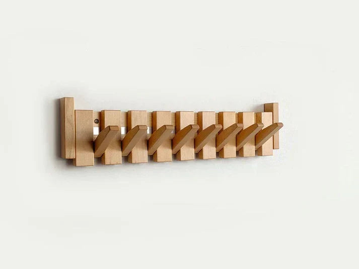 Funktionalität & Ästhetik: Holz Klavier-Kleiderhaken für eine elegante und organisierte Wandgarderobe.