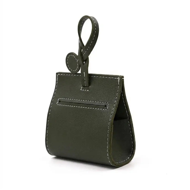Kompakter PU-Leder Kotbeutelspender, robustes und pflegeleichtes Accessoire für Hundeleinen.