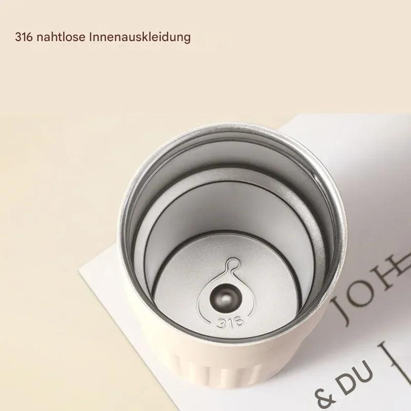 Praktischer Isolierbecher mit Temperaturanzeige, perfekt als Kaffee-, Tee- oder Trinkflasche für unterwegs.