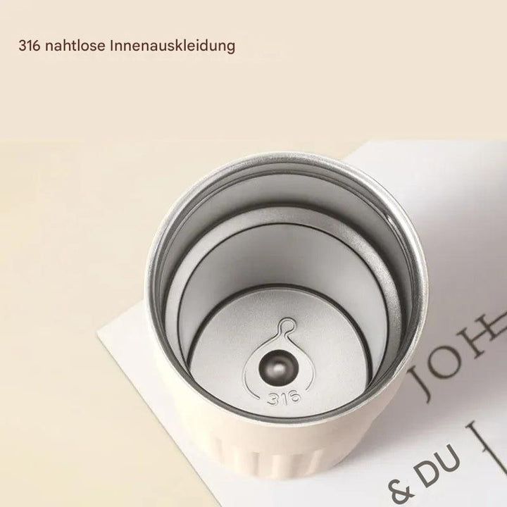 Praktischer Isolierbecher mit Temperaturanzeige, perfekt als Kaffee-, Tee- oder Trinkflasche für unterwegs.