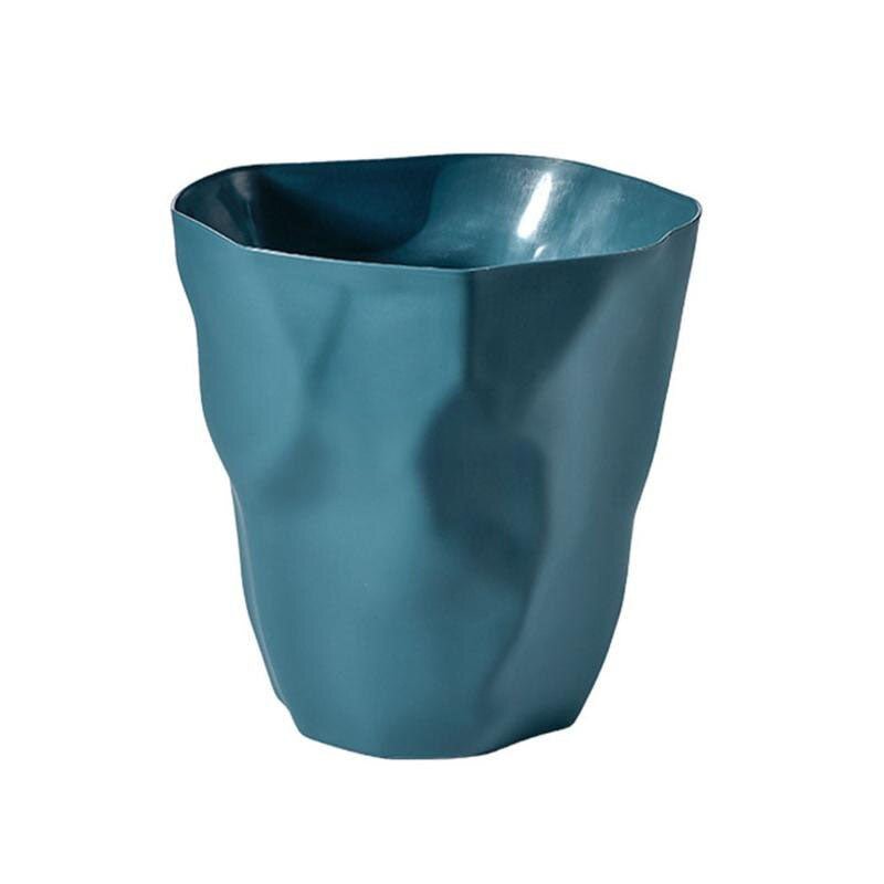 Farbenfroher unregelmäßiger Design-Abfalleimer als stilvolles Wohnaccessoire. Skandinavischer Look für Ihr Büro.
