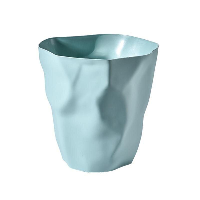 Künstlerischer Kunststoff-Mülleimer in unregelmäßigem, elegantem Design. Skandinavisches Wohnaccessoire für Stilbewusste.